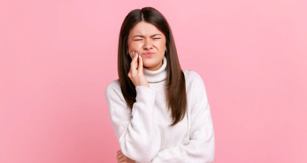 What is tooth erosion and how can it be prevented?
